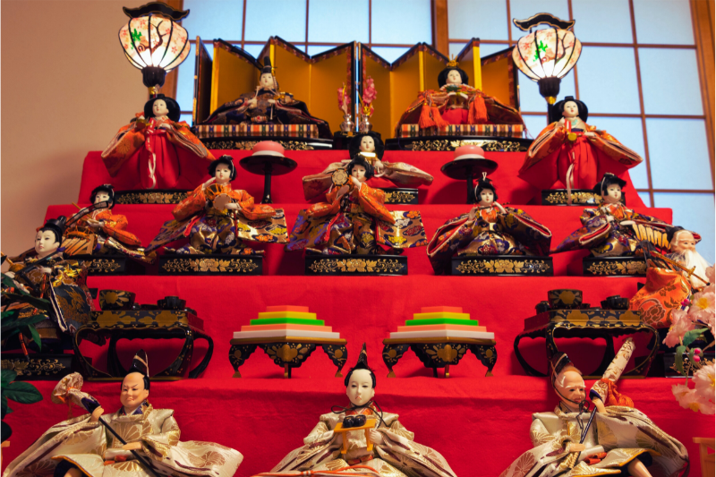Traditional Hina dolls on a seven-tier display for Hinamatsuri