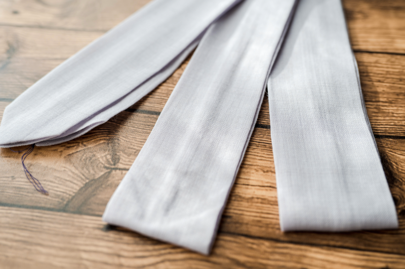 Koshihimo tie used to secure kimono layers