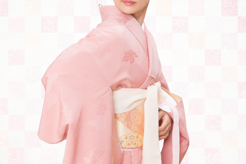 Kimono dressing in progress showing how layers are adjusted