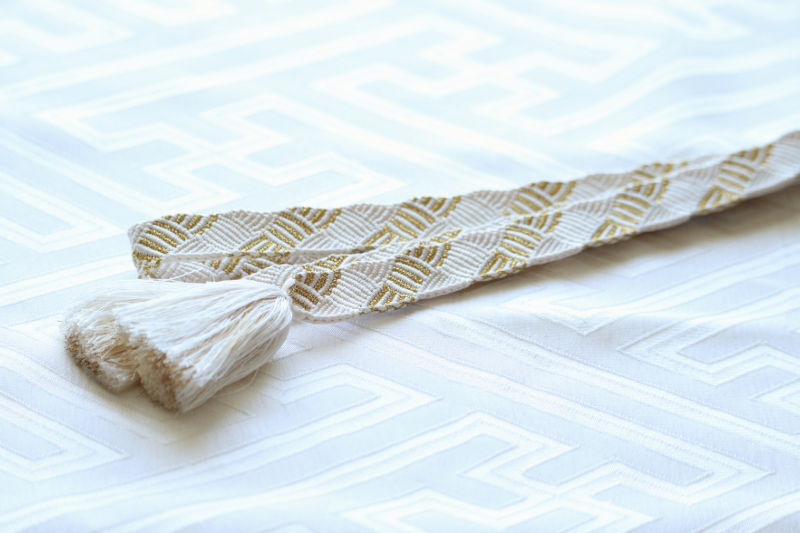 Silk obiage and obijime used to secure and decorate the obi
